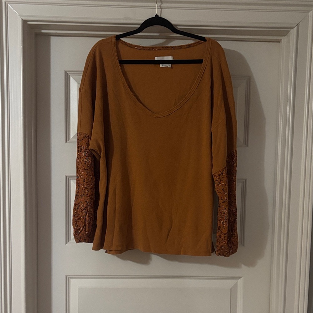 yellow anthropologie top with patterned sleeves